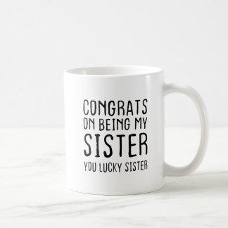 Gratulerar på att vara min syster. kaffemugg