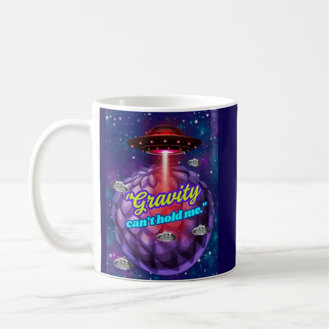 GRAVITATIONEN KAN INTE HÅLLA MIG  KAFFEMUGG (Vänster)