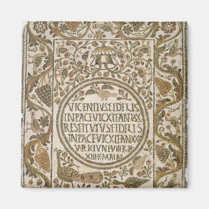 Gravsten med en epitaph magnet