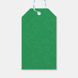 Green textured surface with  swirling pattern presentetikett