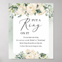 Greenery vit ros satte ring på spelskylten