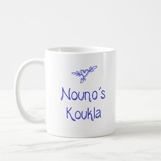 Grekisk mugg Nouno's Koukla "Gudfaderns docka" (Vänster)