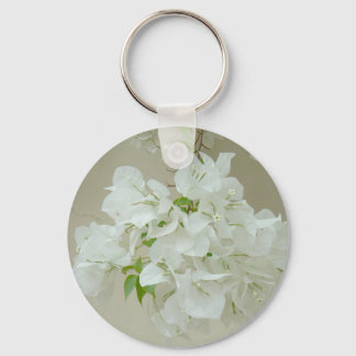 Gren med vita blommor nyckelring