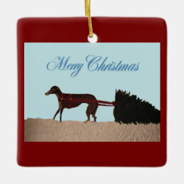 Greyhound drar en julgran genom snö julgransprydnad keramik