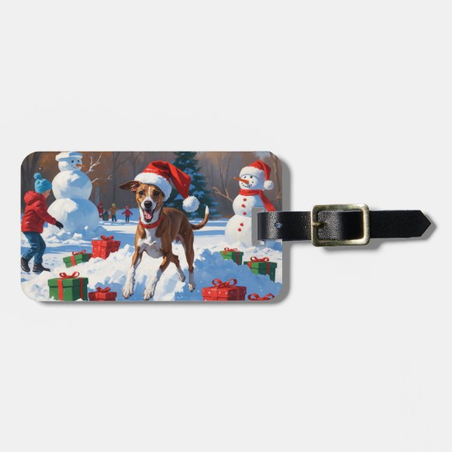 Greyhound springer i snö med julhatt bagagebricka (Horisontell Framsida)