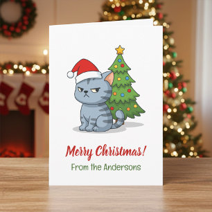 Grinig grå tabbykatt Röda julhatten Julgran Kort
