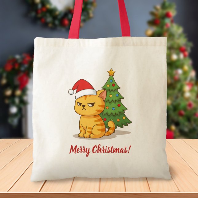 Grinig orange tabby katt röd julhatt julgran tygkasse (Skapare uppladdad)