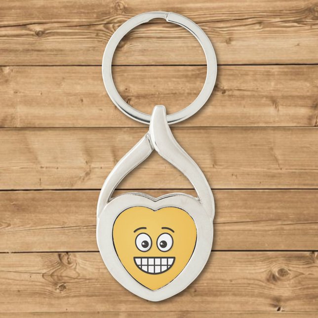 Grinning Ansikte med Open Öga Twisted Heart Silverfärgad Nyckelring (Skapare uppladdad)