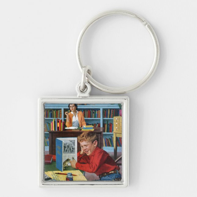 Groda i bibliotek fyrkantig silverfärgad nyckelring (Framsidan)