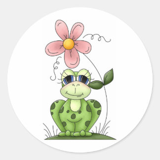 groda med rosa blomma runt klistermärke