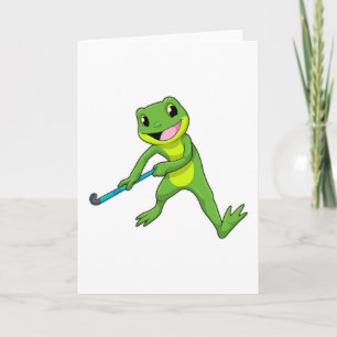 Groda på hockey med hockeyklubba kort