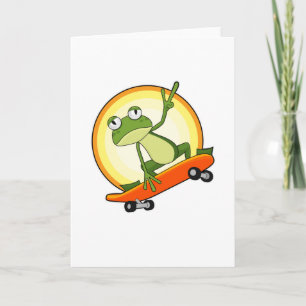 Groda som skateboardåkare med skateboard kort