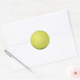 Grön golfboll runt klistermärke