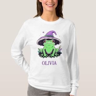 Grön groda som bär lila häxhatt t shirt
