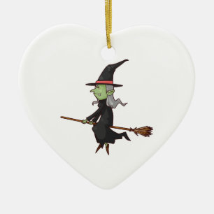Grön häxa med grått hårflyg på broomsticken julgransprydnad keramik