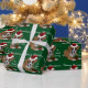 Grön julboxarevalp som slår in papper presentpapper (Holidays)