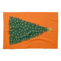 Grön julgran, gyllene springande hästar, orange