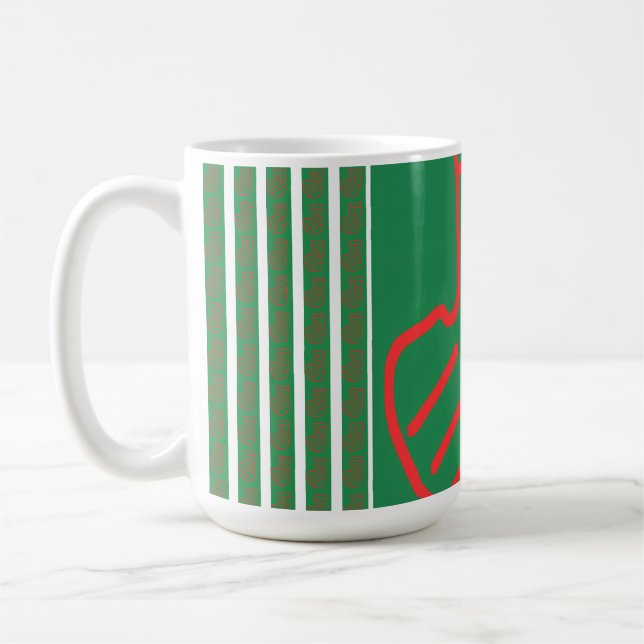 Grön julstrumpa på grön kaffemugg (Vänster)