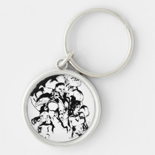 Grön lyktakår som är svartvit rund silverfärgad nyckelring