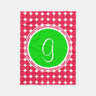 Grön och röd prickig monogram fleecefilt