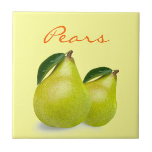 Grön Pearfrukt med löv som uttrycker på gult Kakelplatta