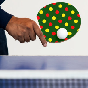 Grön röd gul prickig design pingisracket