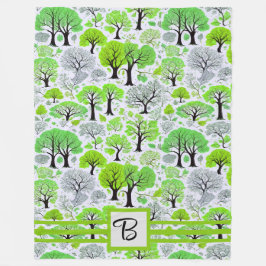Grön skog med monogram fleecefilt