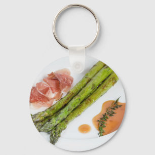 Grön sparris med skinka och sås nyckelring