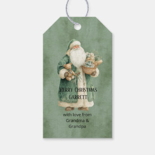 Grön tomte med julleksaker presentetikett