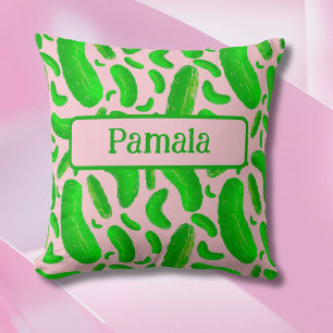 Gröna inlagda gurkor rosa bakgrund kudde