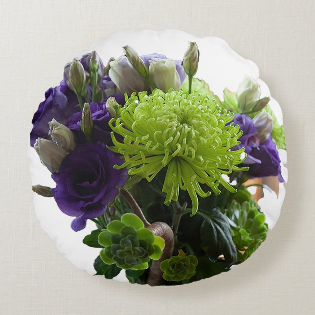 gröna och lila blommor runt kudde (Framsidan)