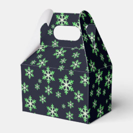 Gröna och vita snöflingor med blå bakgrund presentaskar