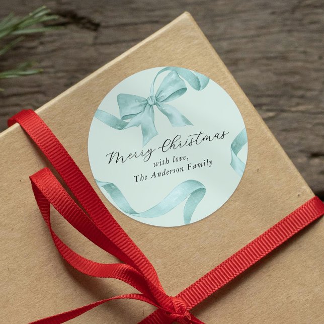 Grönblå julhälsning runt klistermärke (Skapare uppladdad)