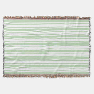 grönt av blek och rand av vitkurit filt