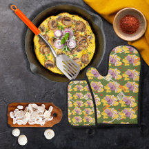 Grönt av spatulas och skrumpna ägg