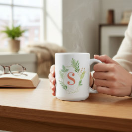 Grönt blomsterinitialer kaffemugg