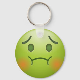 Grönt emoji nyckelring