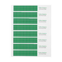 Grönt, fäst figursättning runt etikett