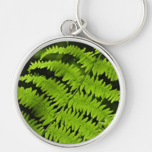 Grönt fern rund silverfärgad nyckelring
