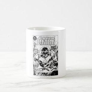 Grönt flyga för lyktor som är svartvitt kaffemugg