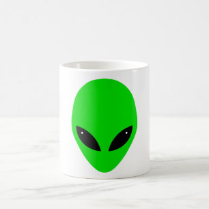 Grönt främmande huvud kaffemugg