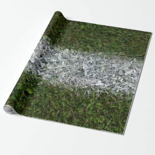 Grönt gräs och vit målar sportfält presentpapper