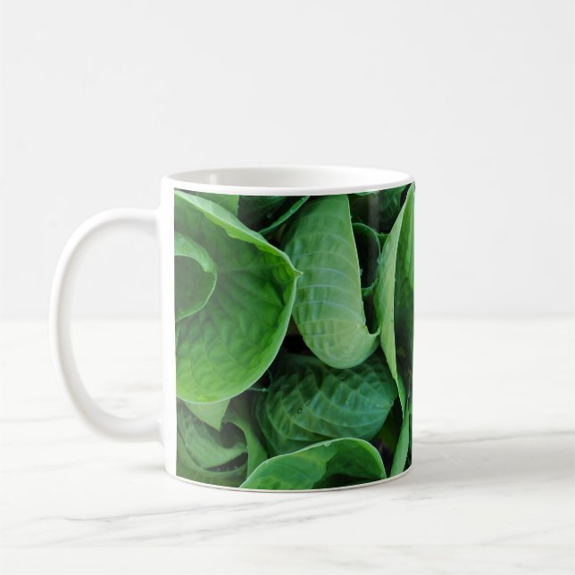 Grönt hosta löv kaffemugg (Vänster)