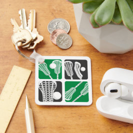 Grönt Lacrosse Blocks of Sticks and Bollar Nyckelring