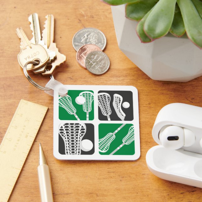 Grönt Lacrosse Blocks of Sticks and Bollar Nyckelring (Skrivbord)