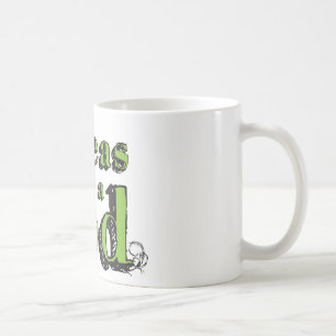 Grönt och svart Hand plockade två ärter i en Po Kaffemugg