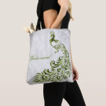 Grönt Peacock Löv Vine Bridesmaid Tote Tygkasse<br><div class="desc">Anpassa en trycksäck för dina brudar med Grönten Peacock Löv Vine Bridesmaid's Tote Bag. Tote-konstruktionen har en lätt grått-grym bakgrund med en pulserande grönt-påk med en löv-förnimmelse. Anpassa med bridesmaiens namn eller behålla till bridessertitel. Ytterligare bröllop-kontorsmaterial och presenter som finns tillgängliga med den här utformningen också. Behöver du hjälp med...</div>