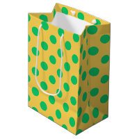 Grönt polka dots på gult