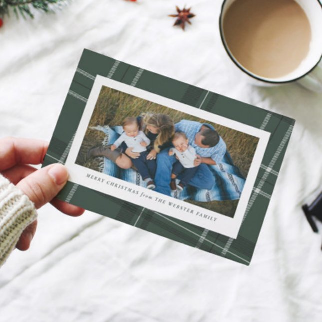 Grönt ram ett fotokort med helgdag julkort (Skapare uppladdad)