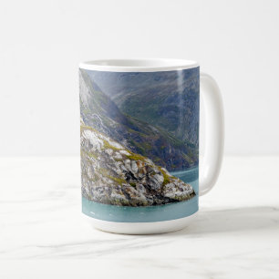 Grönt väcker i blåtten kaffemugg